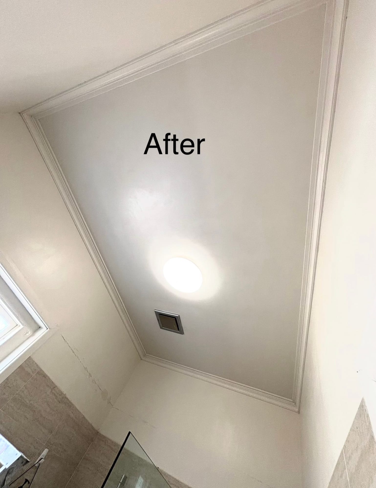 Clean bright ceiling with recessed lighting after treatment